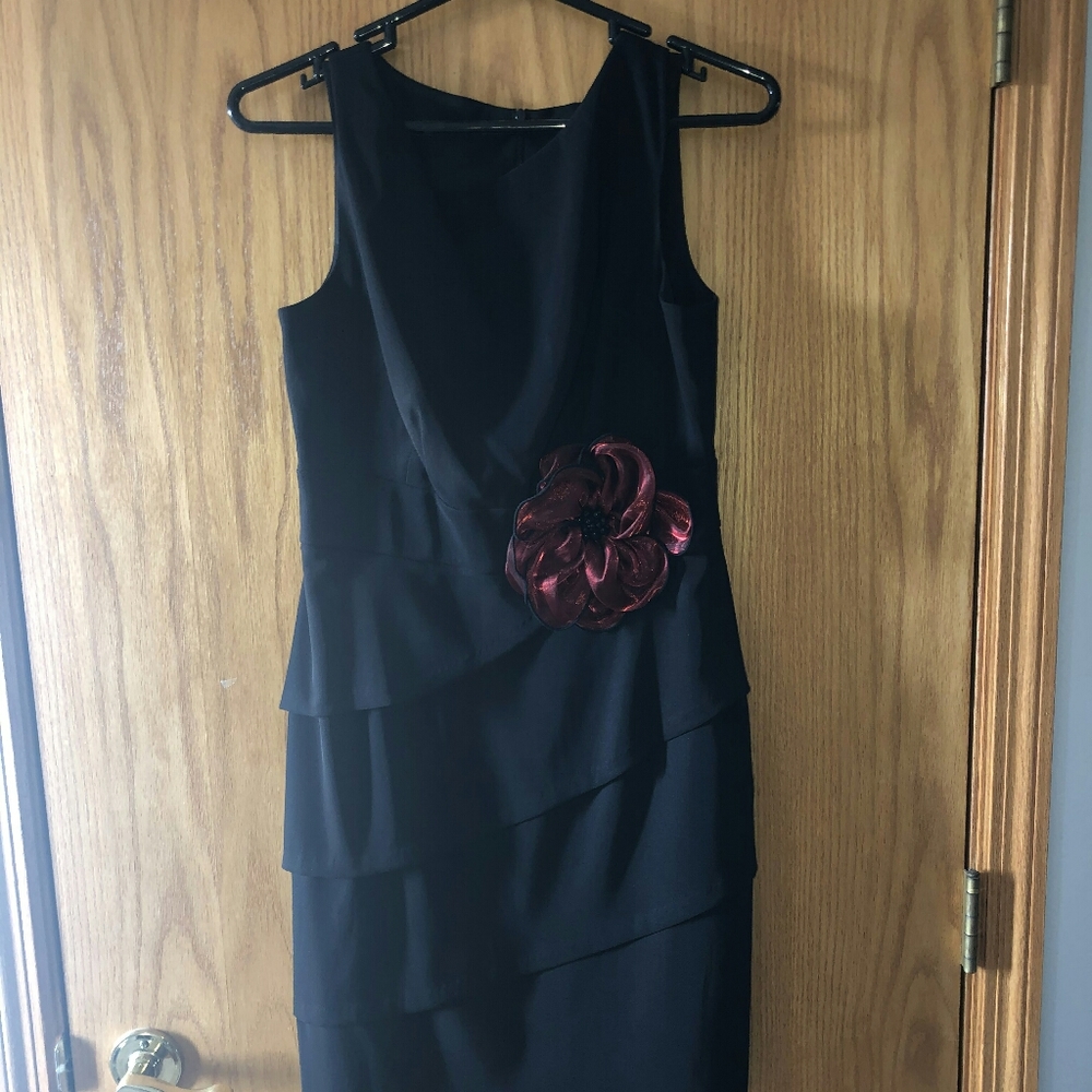 Black dress with red flower